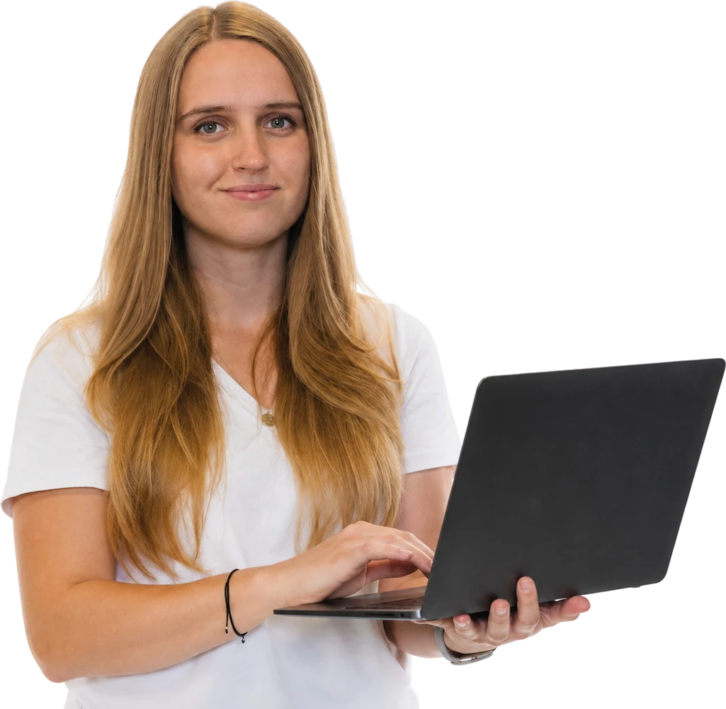 Natalia, website designer and developer, holding a laptop